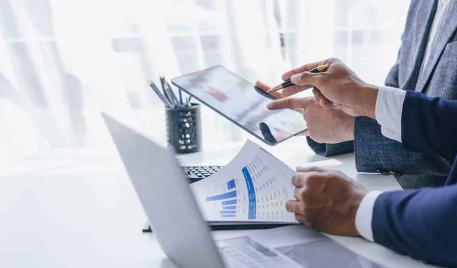 Using tablet pc, Consultant between bookkeepers and accounting lawyer consultation about asset, balance sheet, stock market statistics and yearly tax law, protect business from bribery.